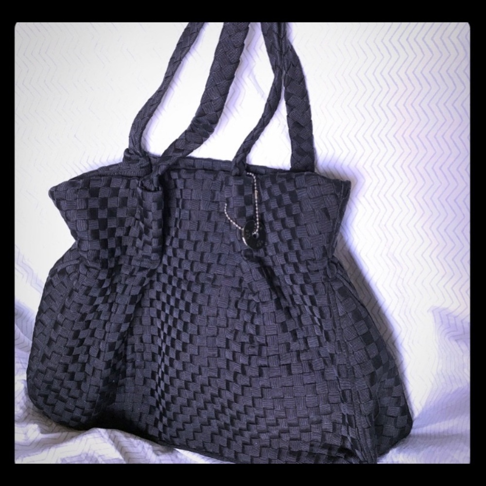 The Sak black woven shoulder bag